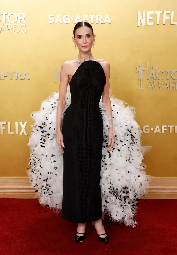 Demi Moore poses on the red carpet at the Actor Awards in Los Angeles.