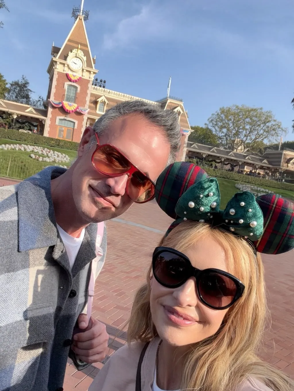 Freddie Prinze Jr. and Sarah Michelle Gellar pose for a selfie at Disneyland.