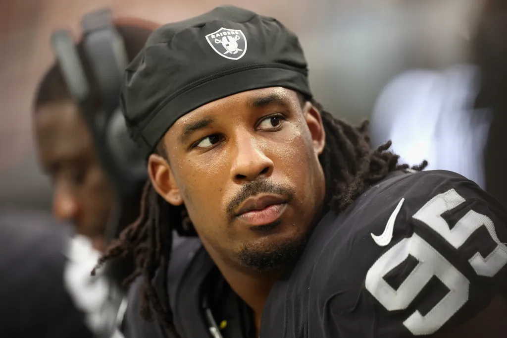 Defensive tackle Kendal Vickers #95 of the Las Vegas Raiders on the sidelines.
