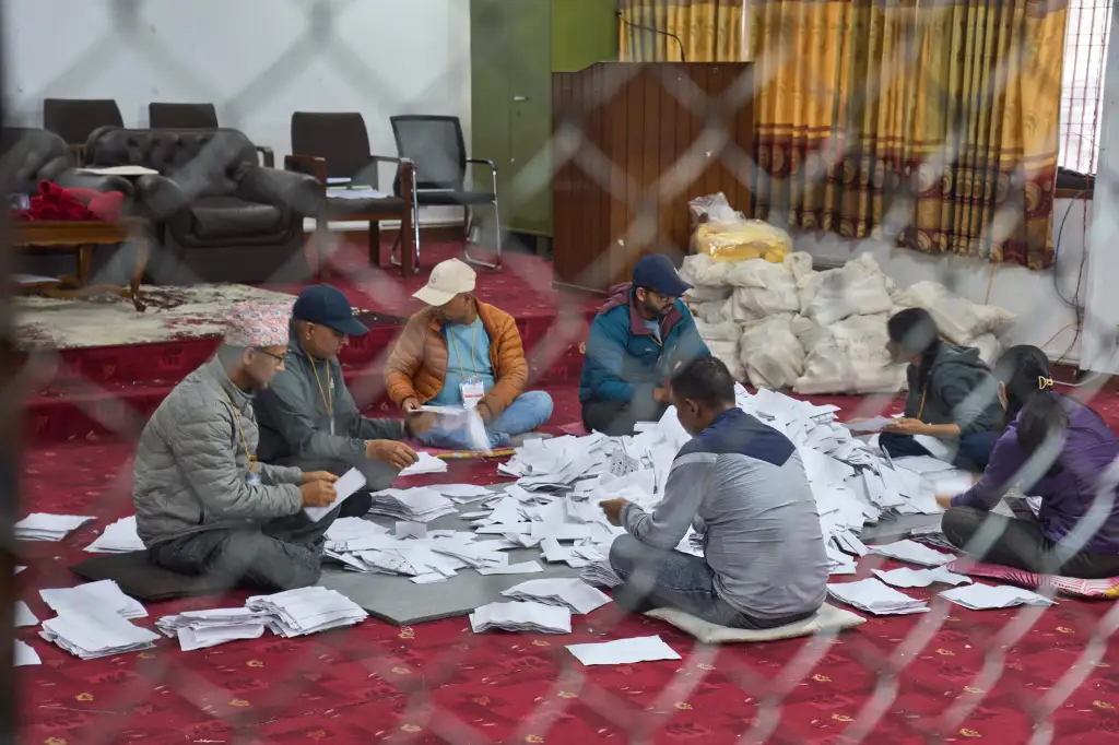 Election officials counting parliamentary election votes in Lalitpur, Nepal.