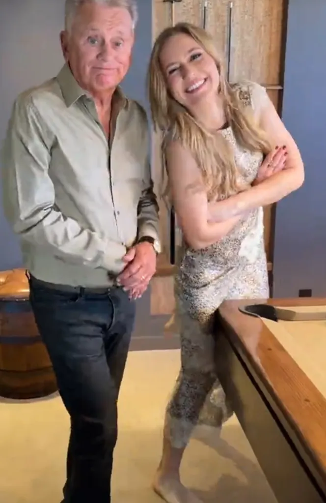 Pat Sajak and his daughter Maggie Sajak next to a pool table.