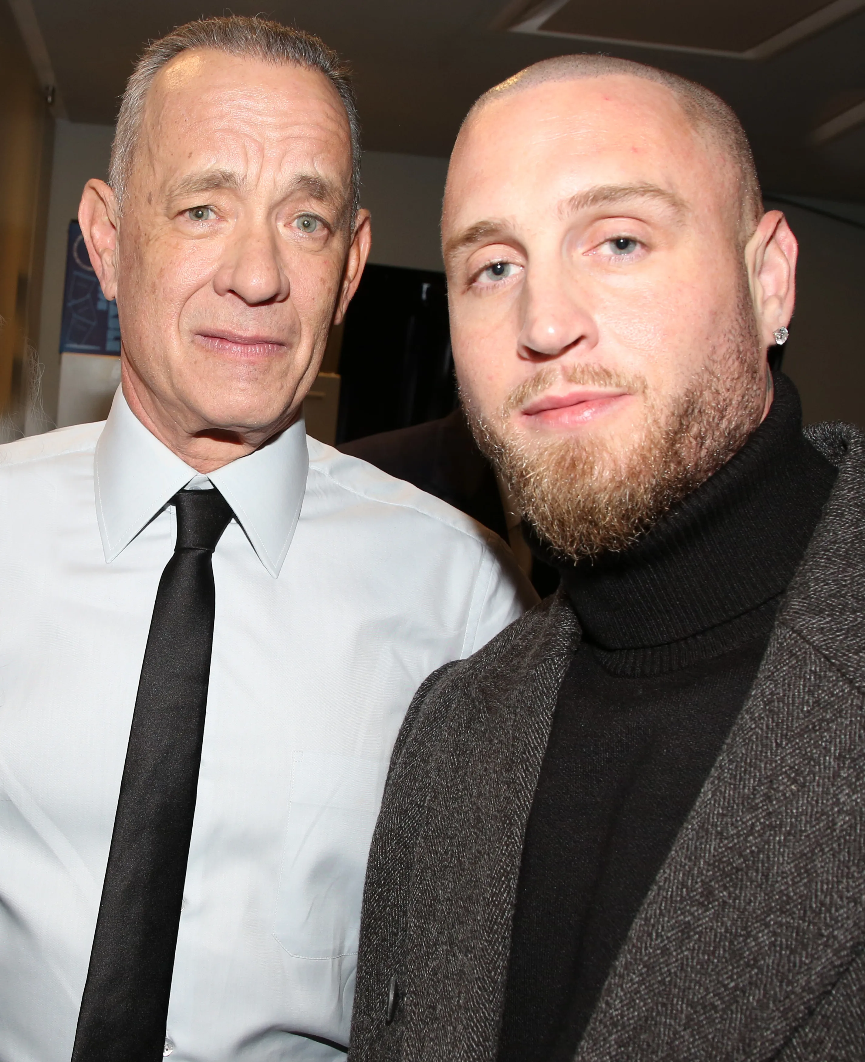 Tom Hanks and Chet Hanks pose for a photo.