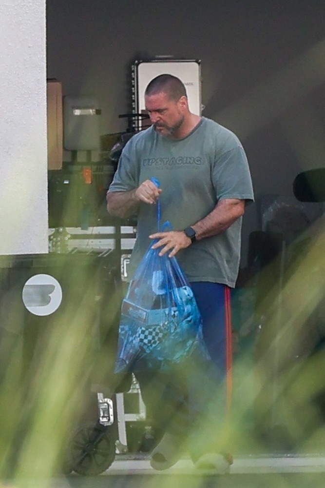 Pascal Duvier taking out the trash.