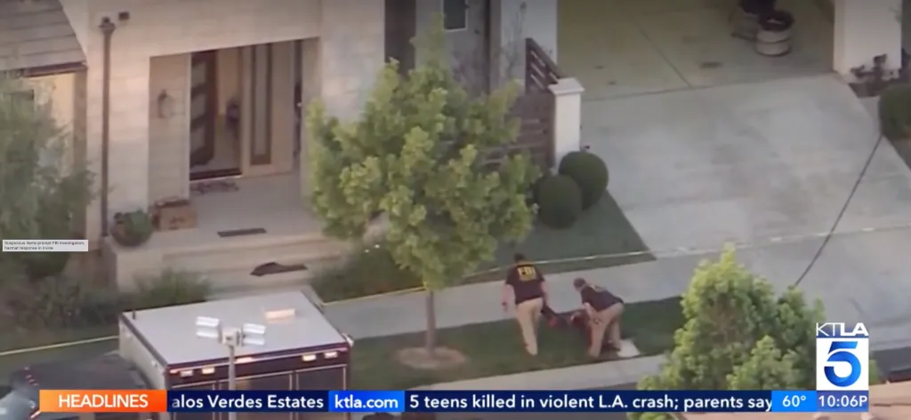 Two FBI agents and a hazmat team investigate a house in Irvine.