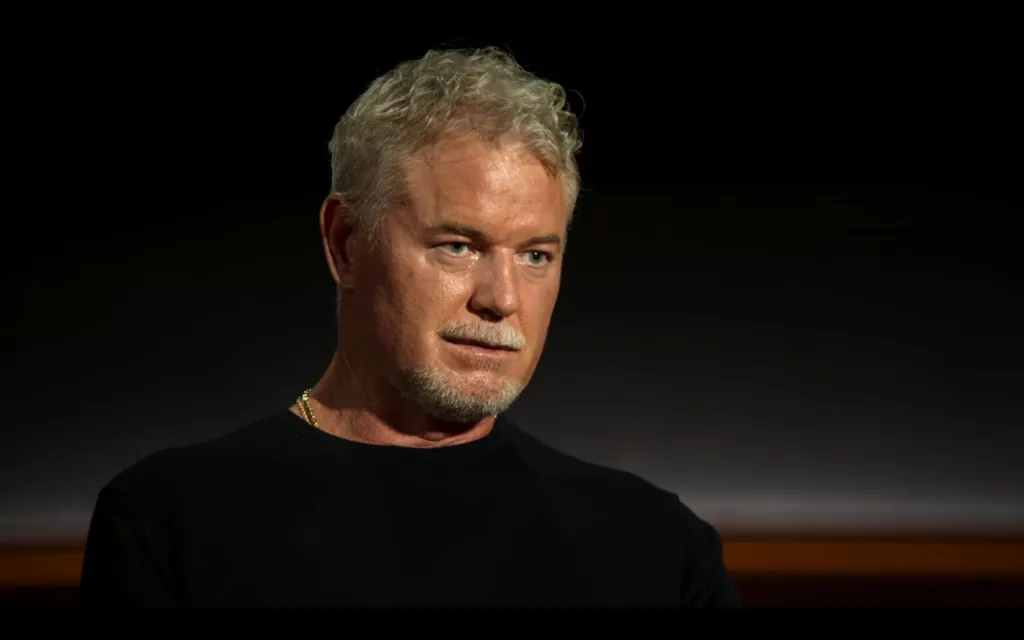 Eric Dane in a black shirt.