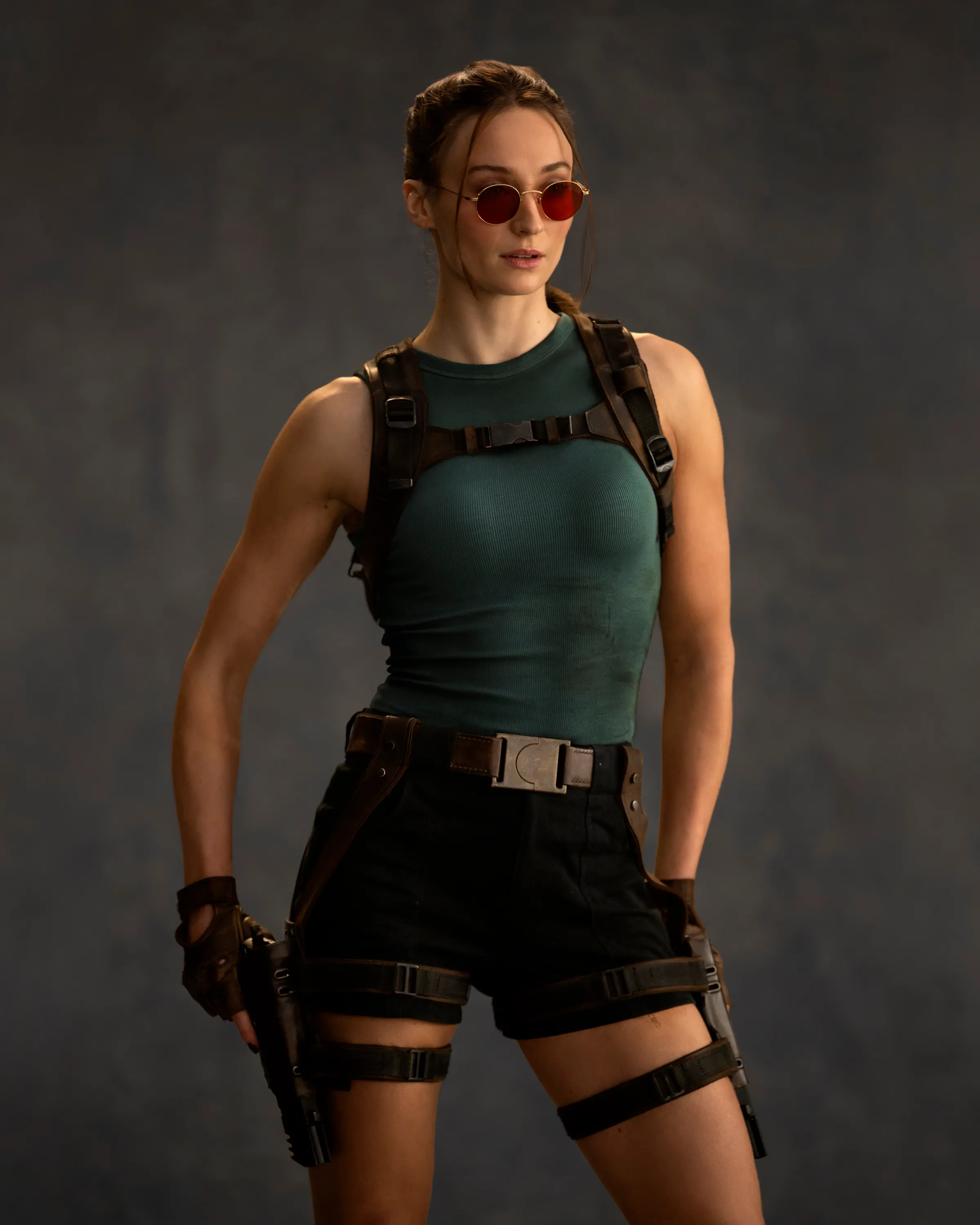 Sophie Turner as Lara Croft from Tomb Raider.