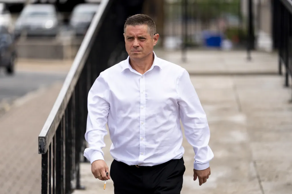 John Alford walking outside St Albans Magistrates' Court.