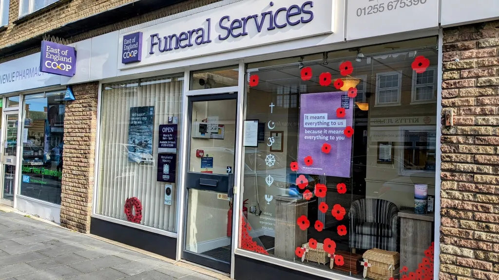 East of England Co-op Funeral Services building with poppy decorations.