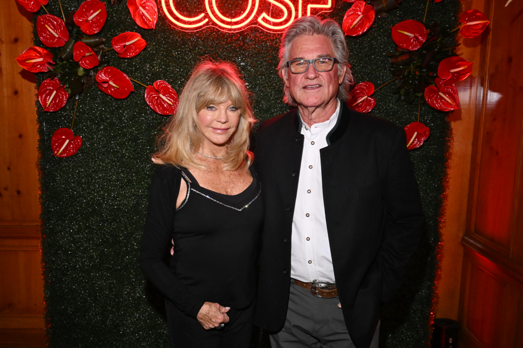Goldie Hawn and Kurt Russell pose for a photo at the Aspen Snow Ball Benefactor Dinner.