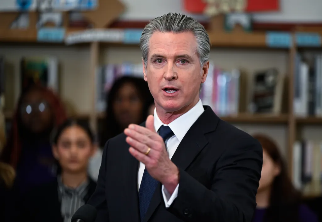 Governor Gavin Newsom speaking at a press conference about expanding economic opportunities for women.
