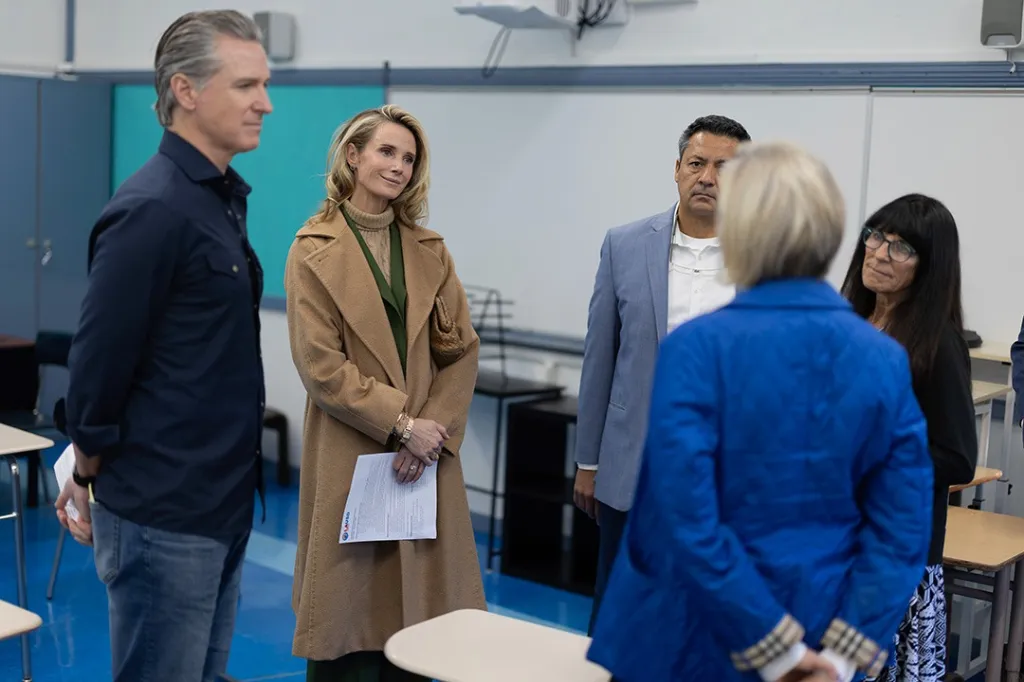 Governor Gavin Newsom and his wife Jennifer Siebel Newsom at Palisades Charter High School.