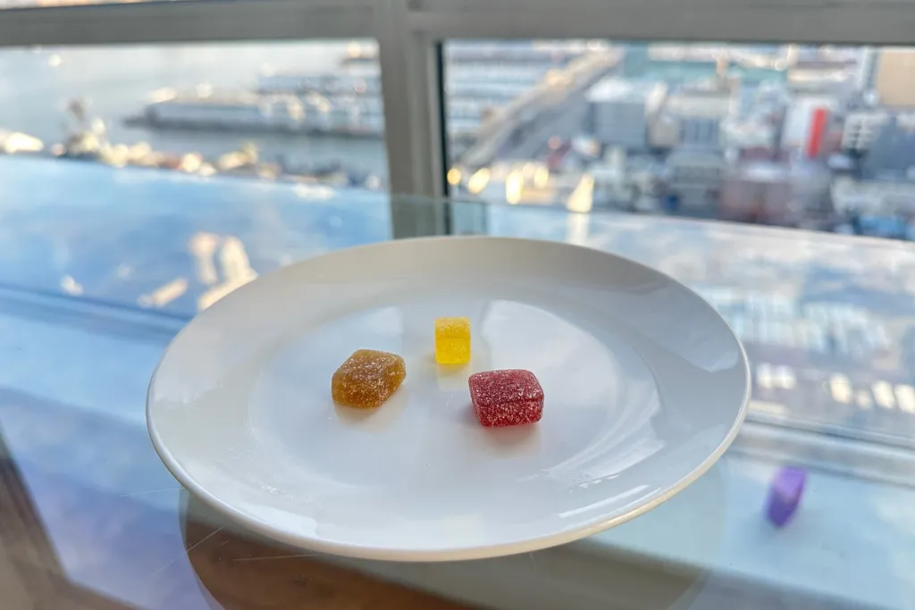 A plate filled with colorful CBD gummy candies
