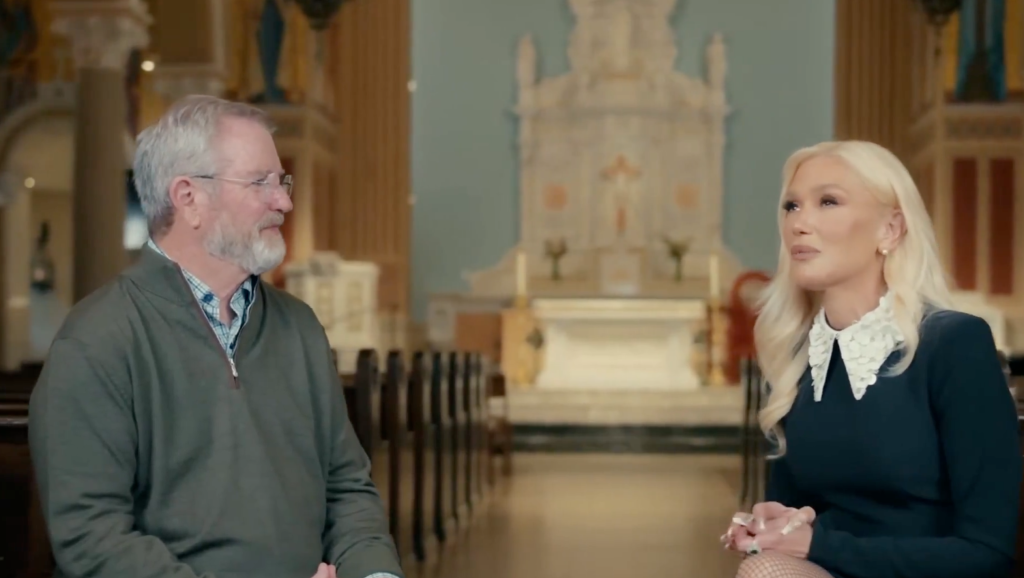 Gwen Stefani and a man talking in a church setting.