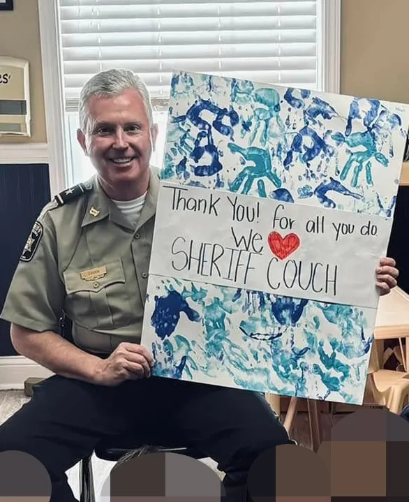 The officers allegedly found two open alcoholic drinks inside the vehicle.