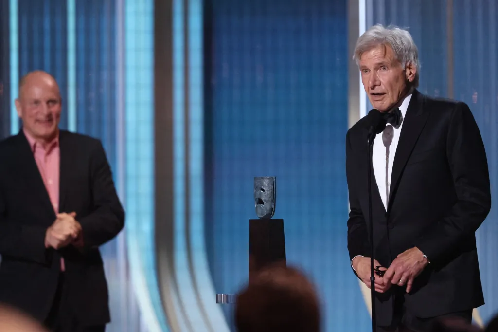 Harrison Ford accepting the Live Achievement award from Woody Harrelson at the Actor Awards.