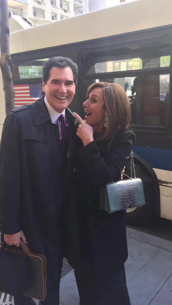 Ernie Anastos and Rosanna Scotto smiling.