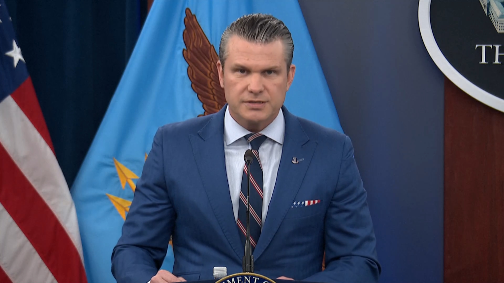 Hegseth speaking at a briefing on Iran.