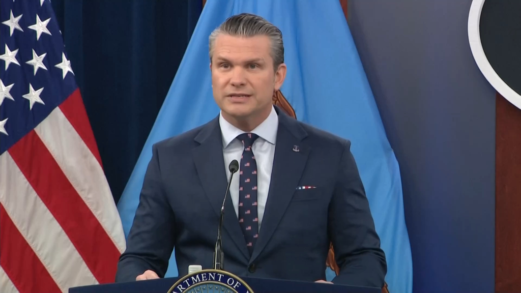 Hegseth speaking at a Pentagon briefing on Iran.