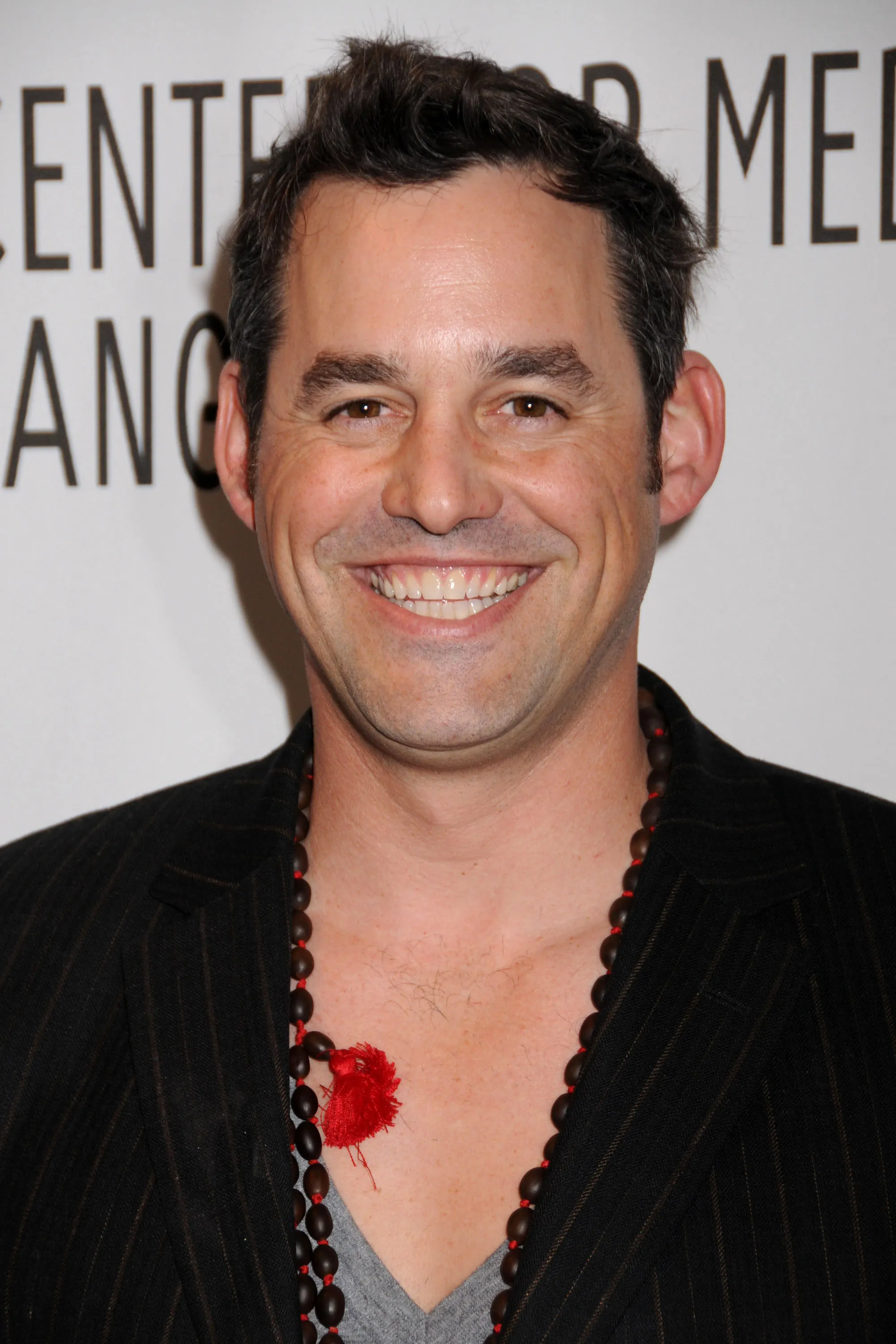 Actor Nicholas Brendon smiling.