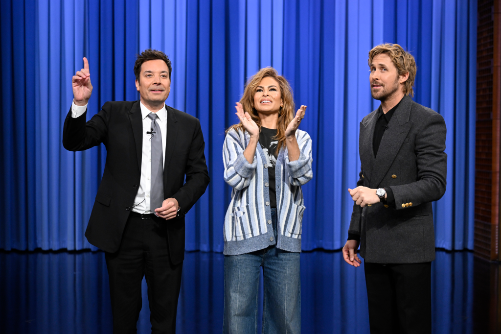 Jimmy Fallon, Eva Mendes, and Ryan Gosling on the set of The Tonight Show.