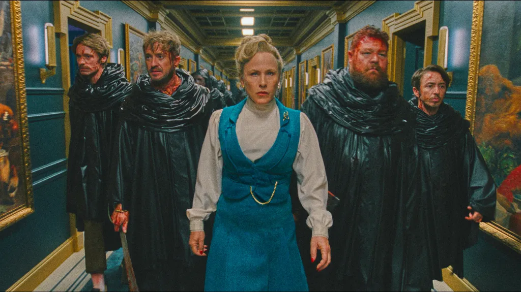 Patricia Arquette, David Viviers, Tom Felton, Willie Ludik, and Gabe Gabriel in a scene from