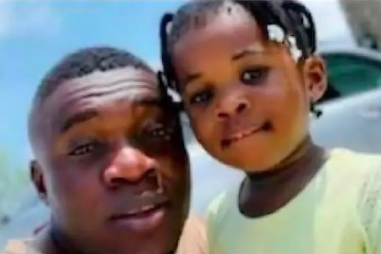 A man and a young girl posing together for a photo.