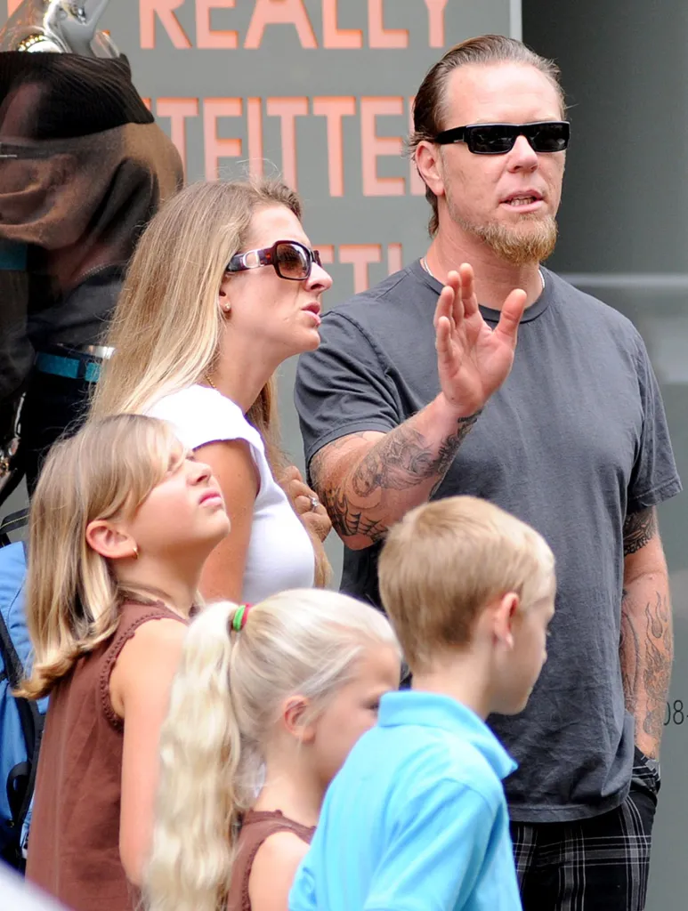 Metallica singer James Hetfield walking with his family in Milan.