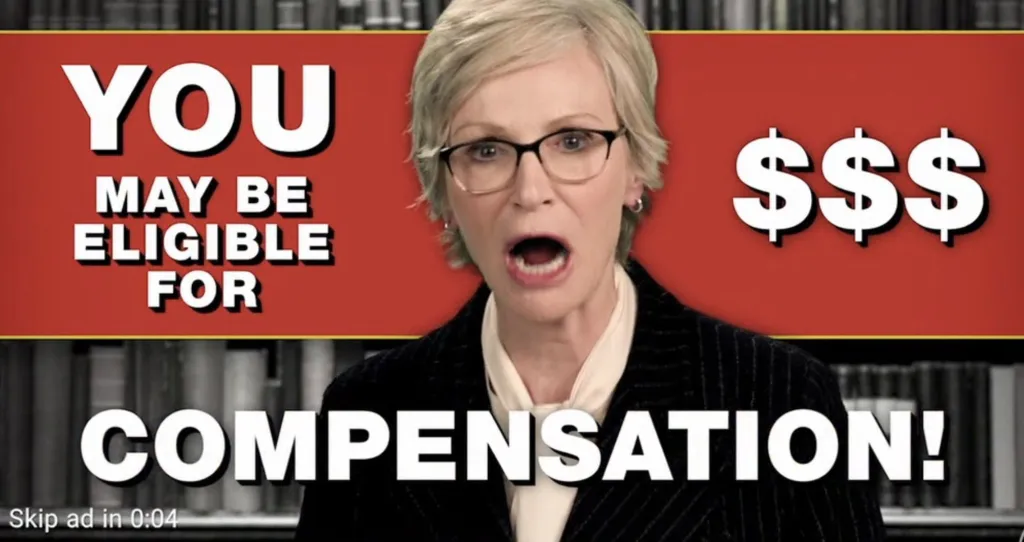 Jane Lynch in a fake ad for compensation.