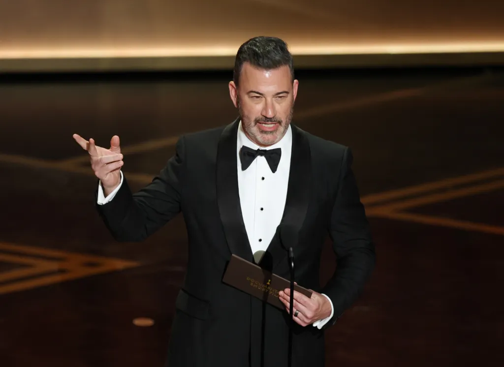 Jimmy Kimmel speaking onstage during the 98th Academy Awards ceremony.