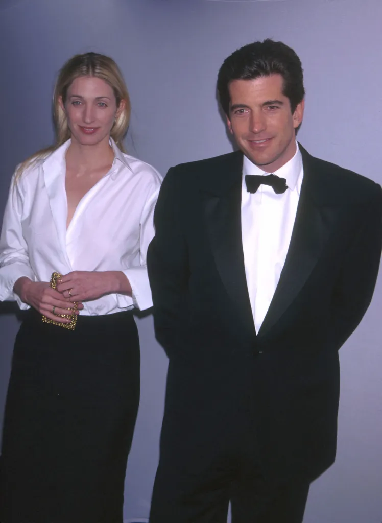 John Kennedy Jr. in a tuxedo and Carolyn Besset in a white shirt and black skirt.
