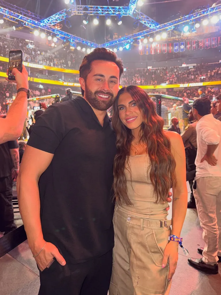 Jordan and Jessi Ngatikaura smiling at a UFC event.