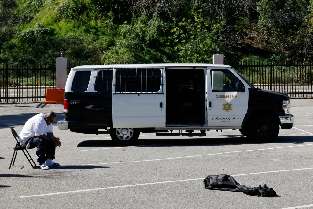 Keiko Gonzalez, leader of the LA 18th Street Gang, is detained at the FBI field command center.