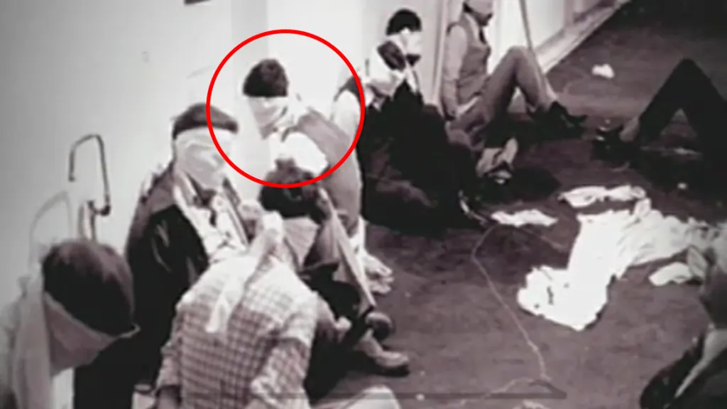 Kevin Hermening, highlighted in red, with other captives at the US Embassy in Tehran.