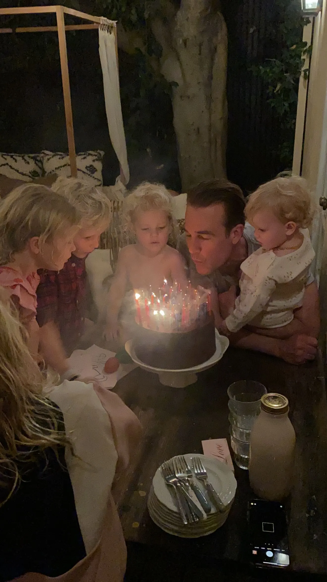 Kimberly and James Van Der Beek with kids.