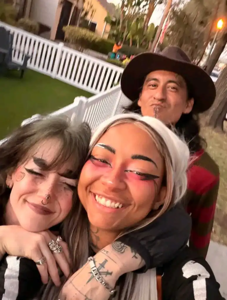 Frank Eric Blackcloud II, Tatyana Brown, and Lexi Bowman smiling together for a selfie.