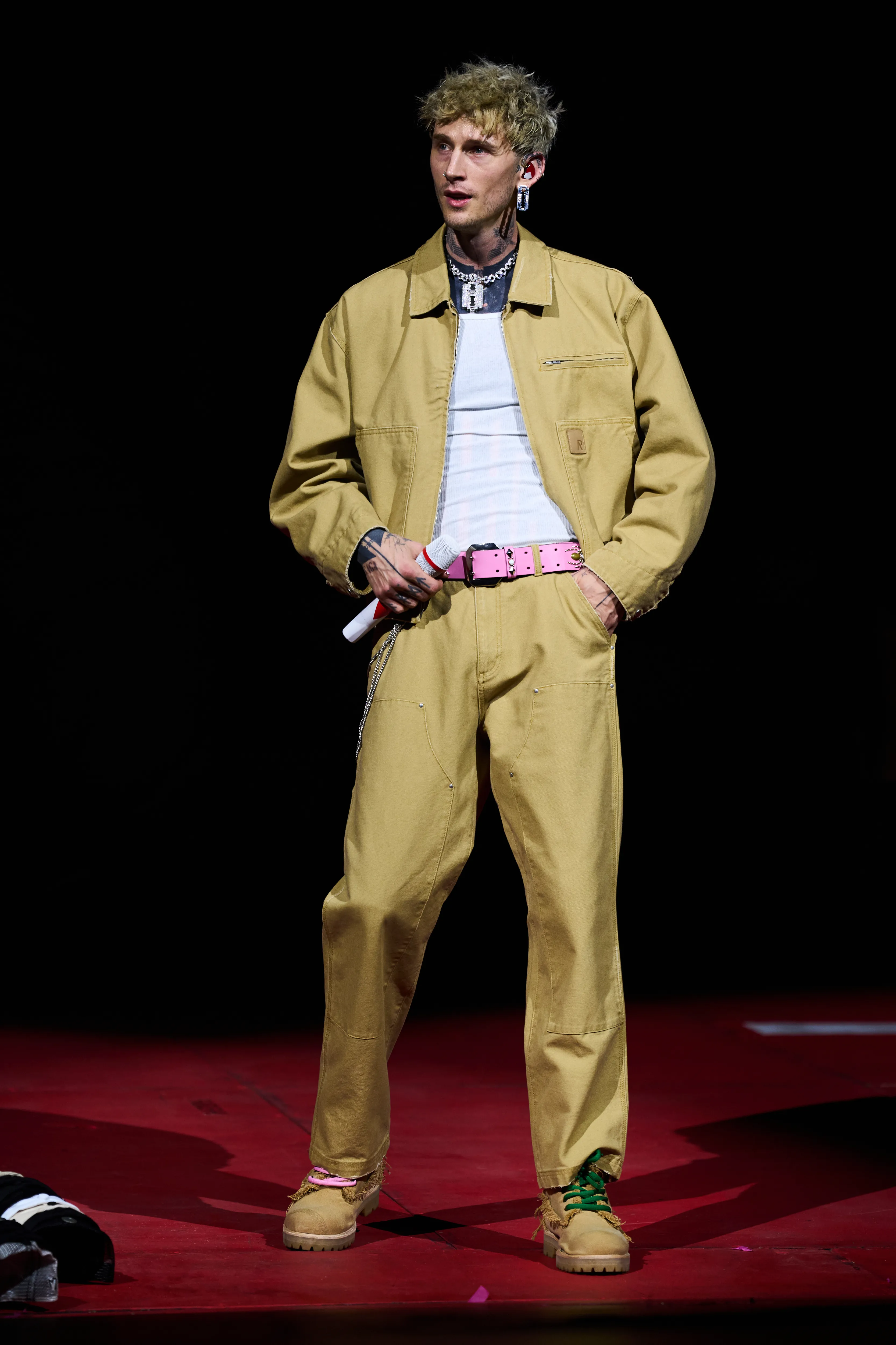 Machine Gun Kelly, pictured performing on, March 5, 2026, invited fans on stage during his concert.