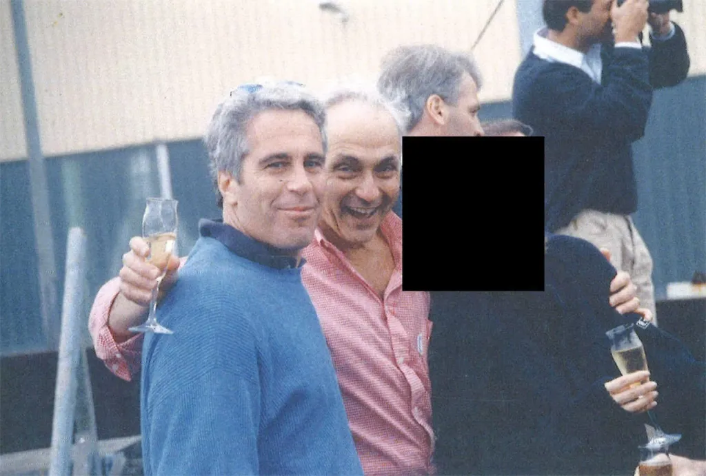 Les Wexner, center, with his arms around Jeffrey Epstein, left, and a person whose face has been redacted at a social gathering.