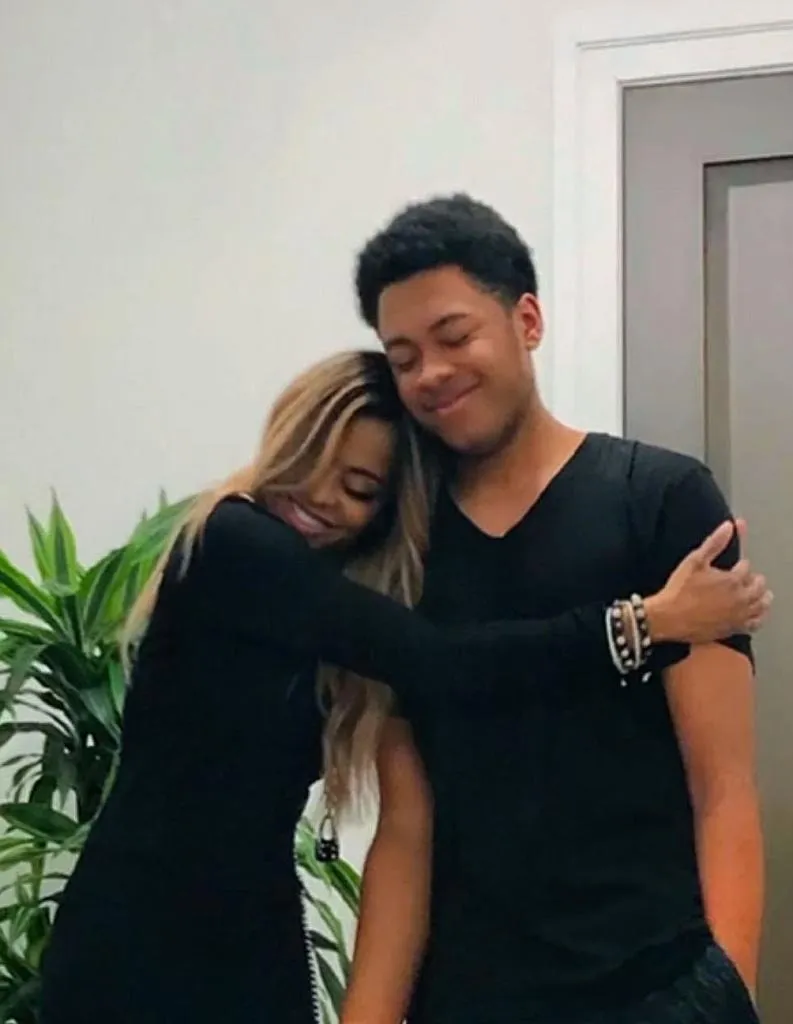 Robert Jr. (pictured here in a shot with his mom) admitted to police that he was on fentanyl at the time of the alleged 2024 incident and did not remember everything.