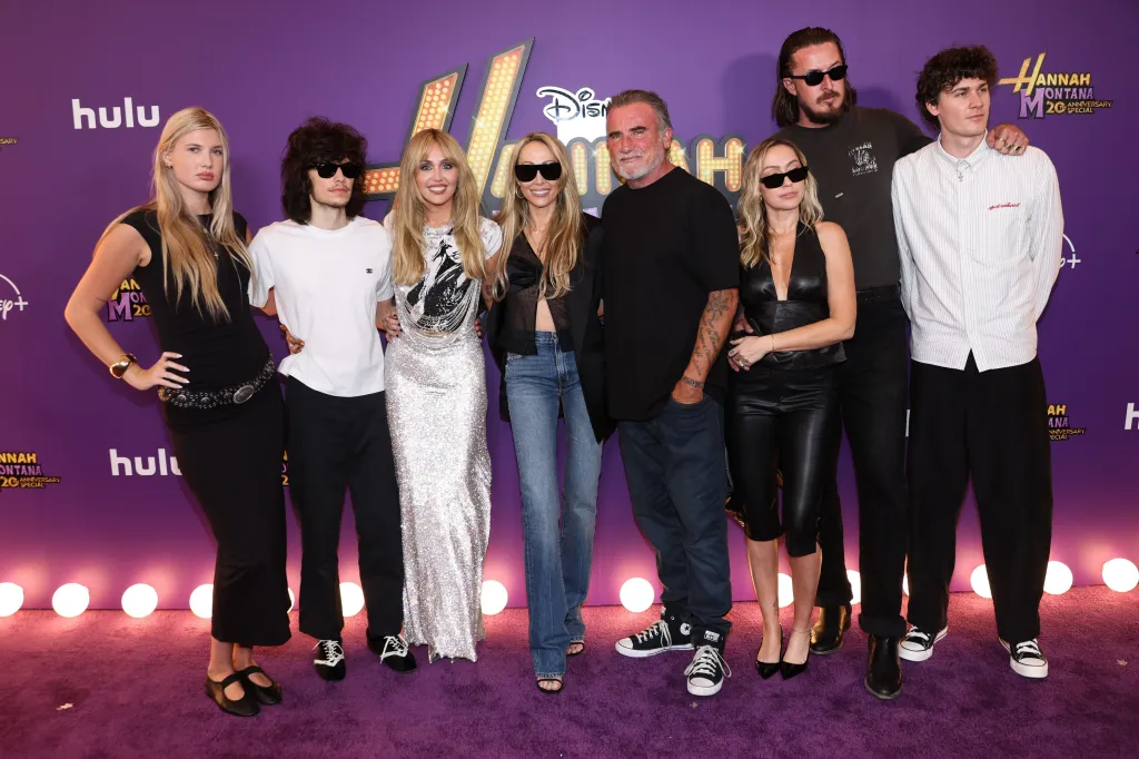 Maxx Morando, Miley Cyrus, Tish Cyrus, Dominic Purcell, Brandi Cyrus, and Joshua Purcell pose at the 'Hannah Montana 20th Anniversary Special' World Premiere.