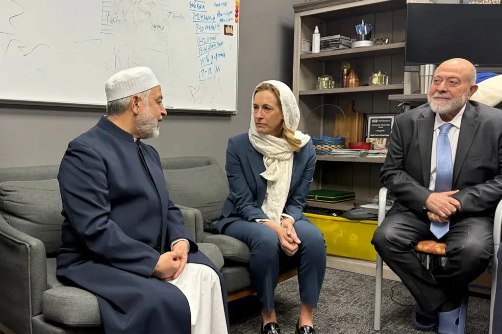 Mikie Sherrill at the Islamic Center of Passaic County with Imam Qatanani and another man.
