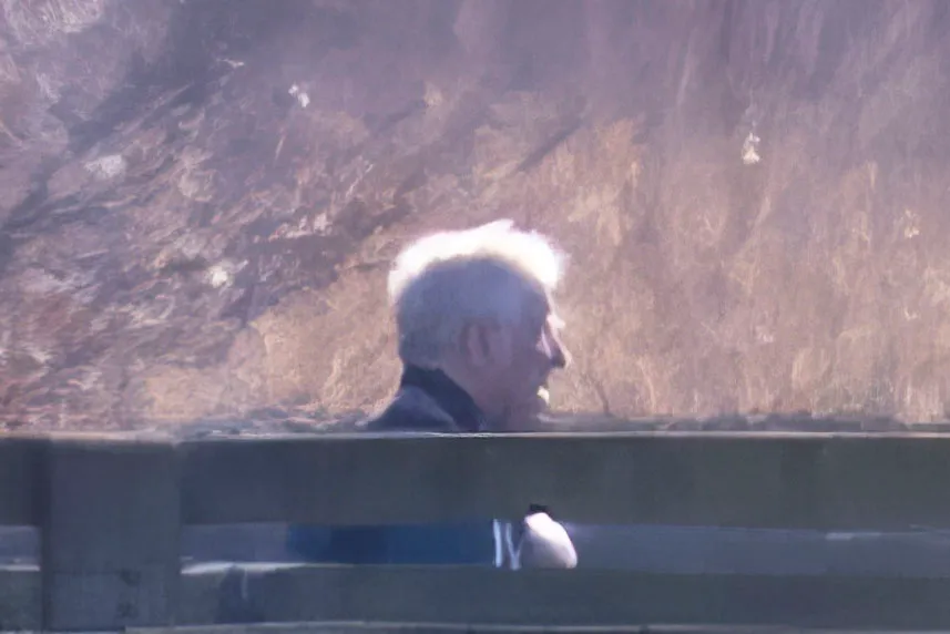 Andrew Mountbatten Windsor walking near his Norfolk home.