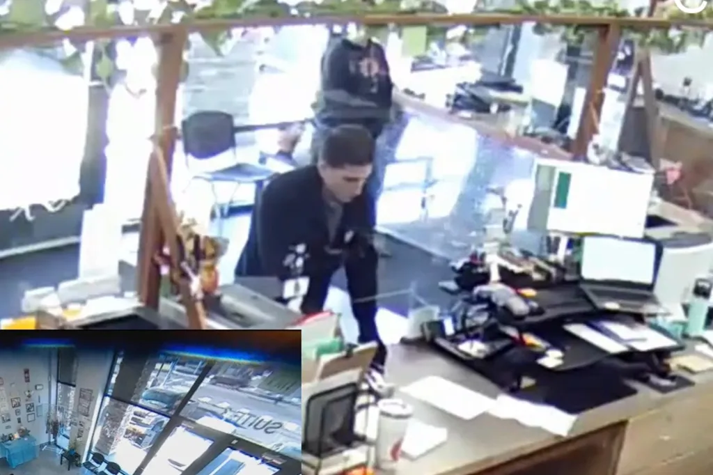 Kohberger, wearing black gloves, fills out a form while carrying a casual conversation with the workers.