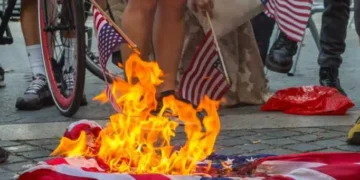 Trump DOJ quietly quits case against flag-burning protester at White House