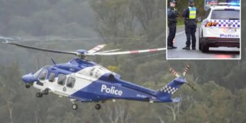 Australian police fatally shoot a suspect in a 3-hour standoff after 2 officers killed