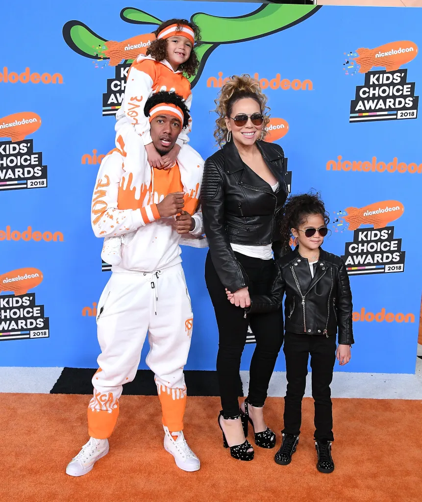 Nick Cannon with his children Moroccan and Monroe, and Mariah Carey at the 2018 Kids' Choice Awards.