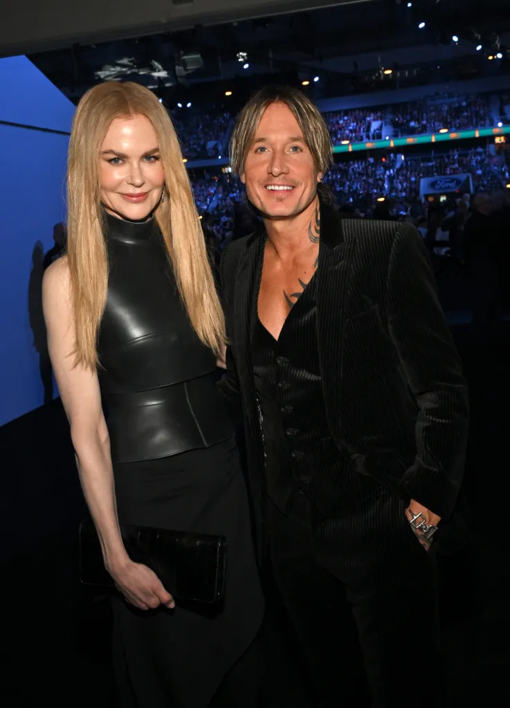 Nicole Kidman in a black leather top and Keith Urban in a pinstripe suit at the 60th Academy Of Country Music Awards.