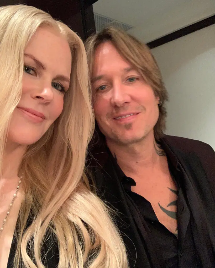 Nicole Kidman and Keith Urban pose for a selfie, smiling.