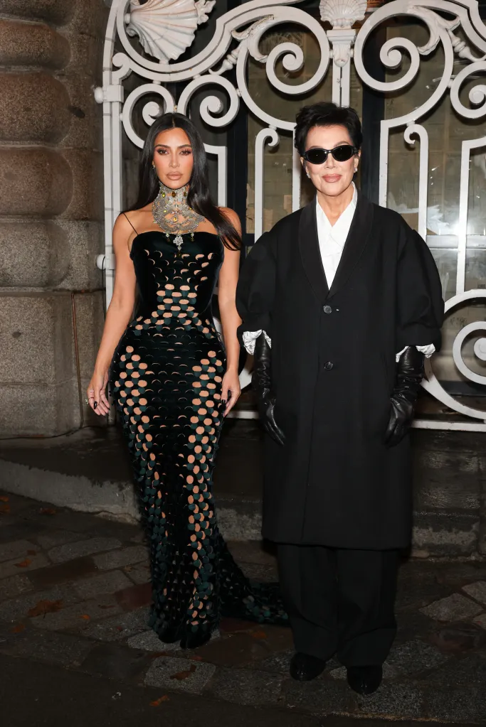 Kim Kardashian and Kris Jenner posing at Paris Fashion Week.