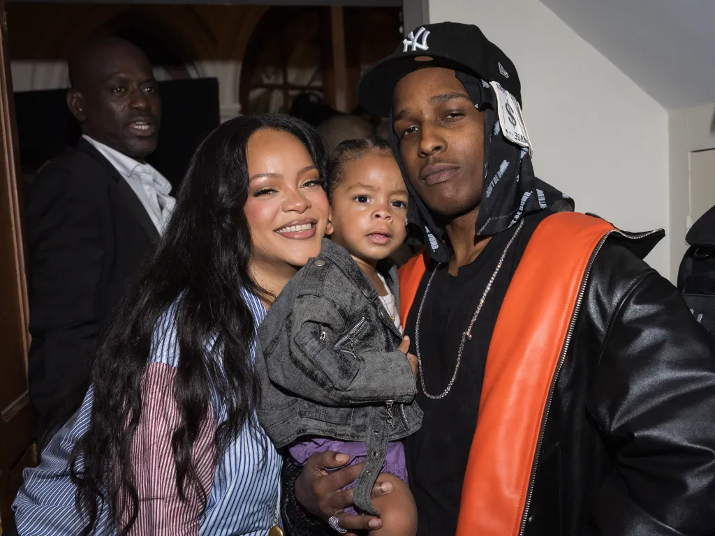 Rihanna, her son Riot, and ASAP Rocky attend the AWGE Menswear Spring/Summer 2026 show.