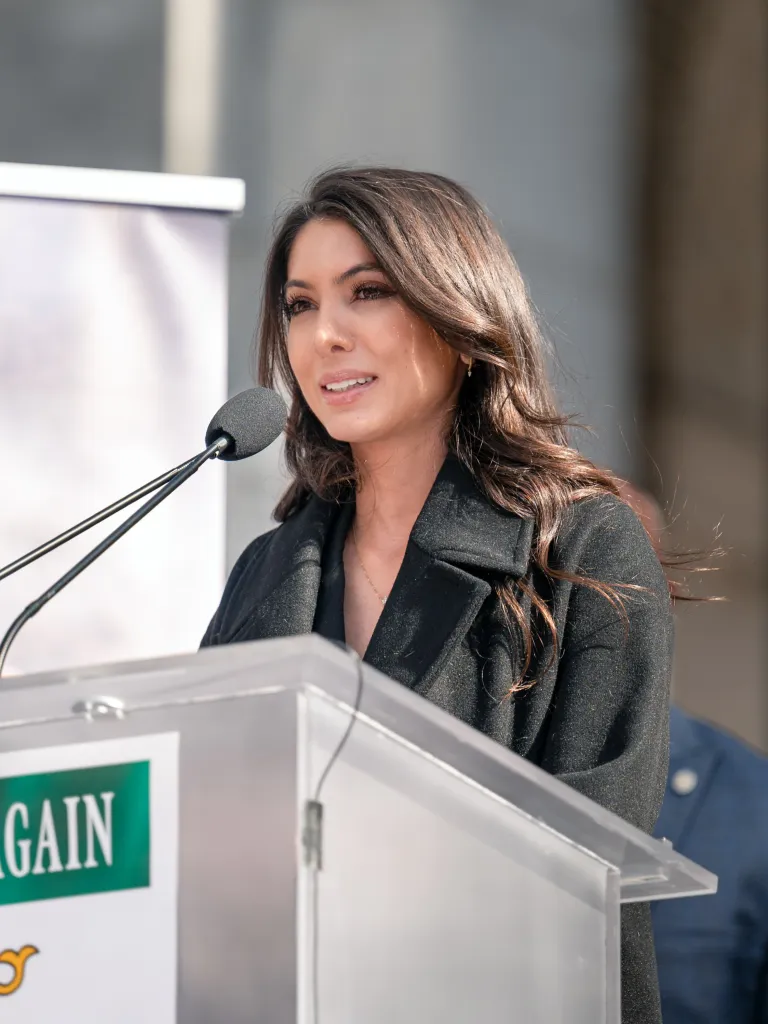 Noor Pahlavi speaking at a protest in Los Angeles.